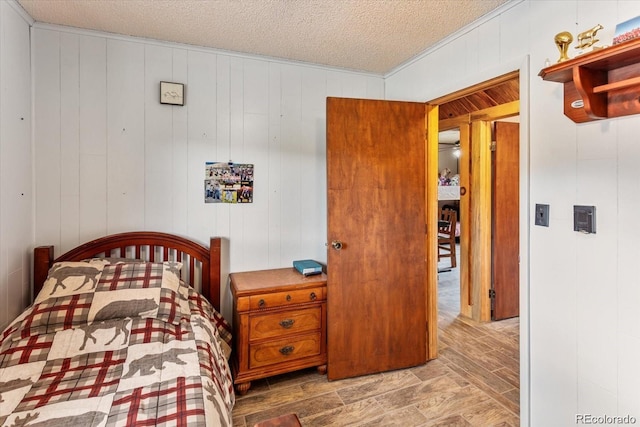 11679 US Highway 50, Howard, CO 81233 - bedroom featuring ornamental molding and a textured ceiling