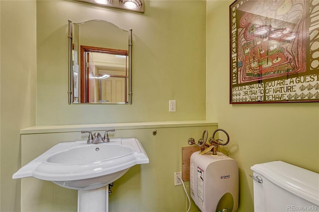 half bathroom with toilet
