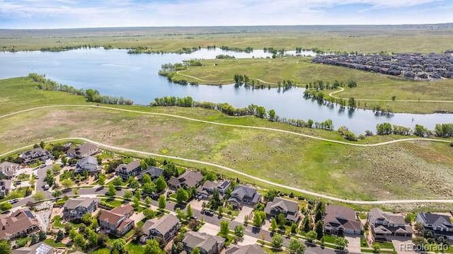 26741 E Arbor Dr, Aurora, CO 80016 - aerial view of property and surrounding area featuring a large body of water and nearby suburban area