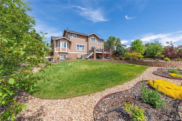 26741 E Arbor Dr, Aurora, CO 80016 - back of house with stairway and a yard
