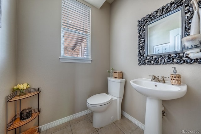 26741 E Arbor Dr, Aurora, CO 80016 - half bathroom with toilet, tile patterned flooring, and baseboards