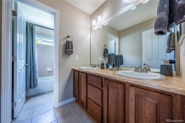 26741 E Arbor Dr, Aurora, CO 80016 - bathroom with double vanity, tile patterned floors, and baseboards