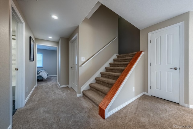 26741 E Arbor Dr, Aurora, CO 80016 - stairway featuring carpet flooring, baseboards, and recessed lighting