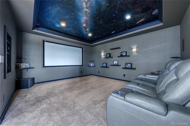 26741 E Arbor Dr, Aurora, CO 80016 - carpeted cinema room with a tray ceiling and baseboards