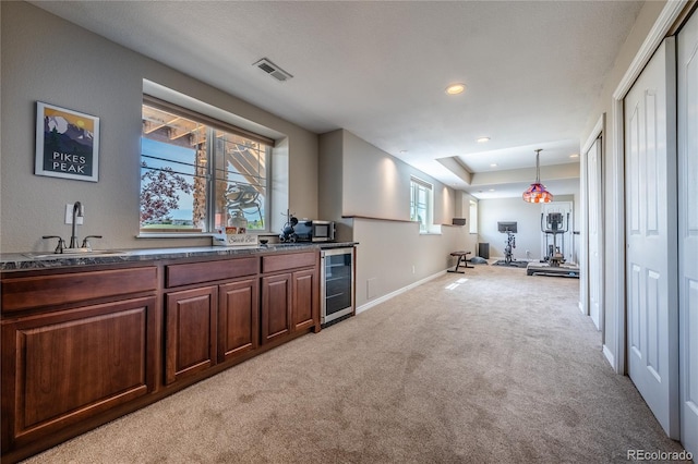 26741 E Arbor Dr, Aurora, CO 80016 - bar area featuring beverage cooler, a sink, light colored carpet, recessed lighting, and baseboards