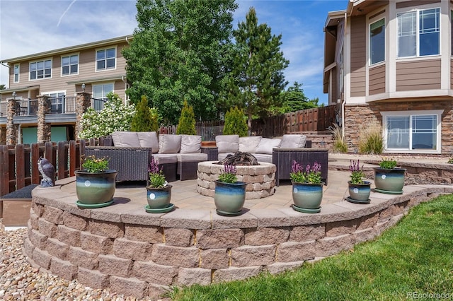 26741 E Arbor Dr, Aurora, CO 80016 - view of patio / terrace with an outdoor living space with a fire pit