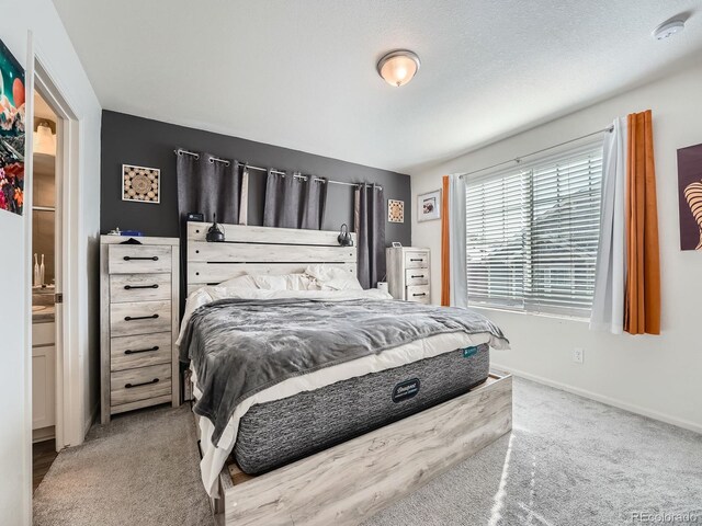 17991 E 103rd Ave, Commerce City, CO 80022 - carpeted bedroom featuring baseboards
