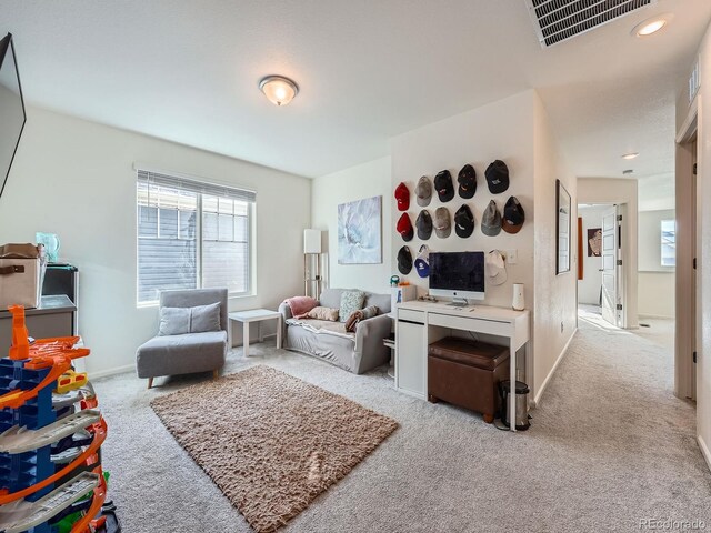 17991 E 103rd Ave, Commerce City, CO 80022 - carpeted living area with baseboards