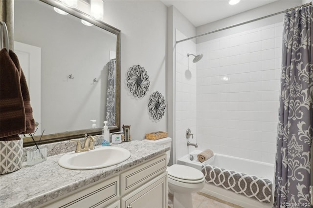 full bathroom with tile patterned flooring, shower / bath combo, toilet, and vanity