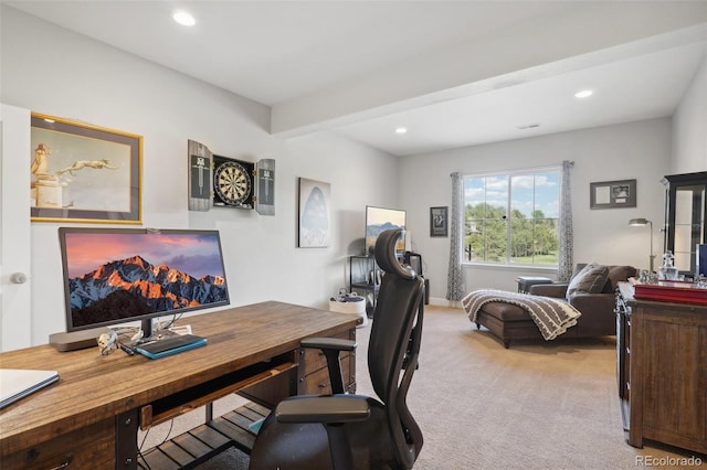 carpeted office with beamed ceiling