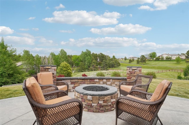 view of patio with a fire pit