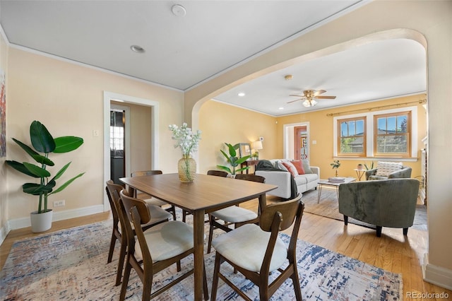 1601 Albion St, Denver, CO 80220 - dining area with arched walkways, healthy amount of natural light, light wood-type flooring, recessed lighting, and ceiling fan