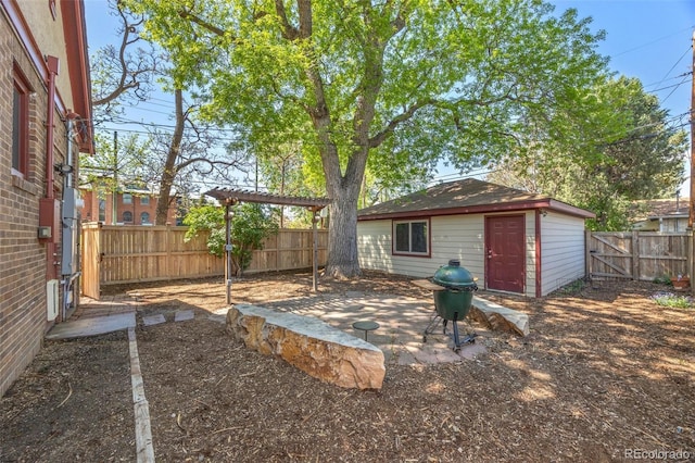 1601 Albion St, Denver, CO 80220 - fenced backyard featuring a patio