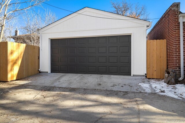 detached garage with fence