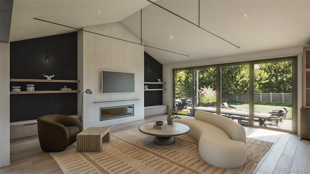 living room featuring a large fireplace, light hardwood / wood-style floors, and lofted ceiling