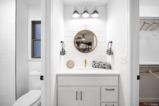 7651 Robb St, Arvada, CO 80005 - full bath with toilet and vanity