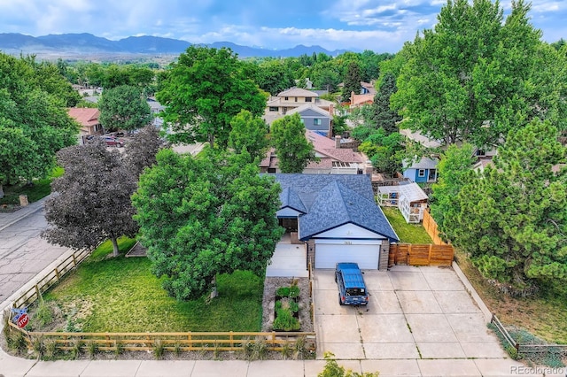 7651 Robb St, Arvada, CO 80005 - aerial view of residential area with a mountain backdrop