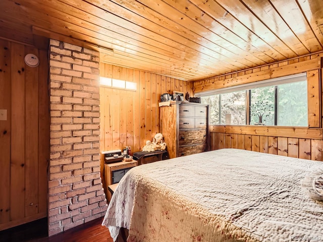 6837 S Brook Forest Rd, Evergreen, CO 80439 - bedroom with wooden ceiling, wood walls, and dark wood-style floors