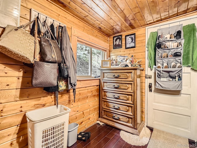 6837 S Brook Forest Rd, Evergreen, CO 80439 - bedroom with wooden walls, wooden ceiling, and dark wood-style floors