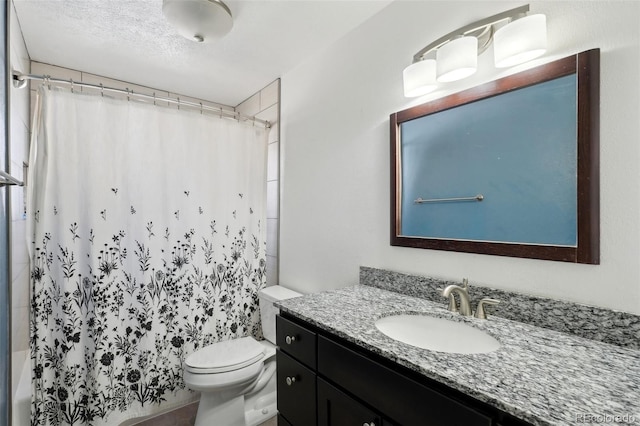 bathroom featuring shower / bathtub combination with curtain, vanity, and toilet