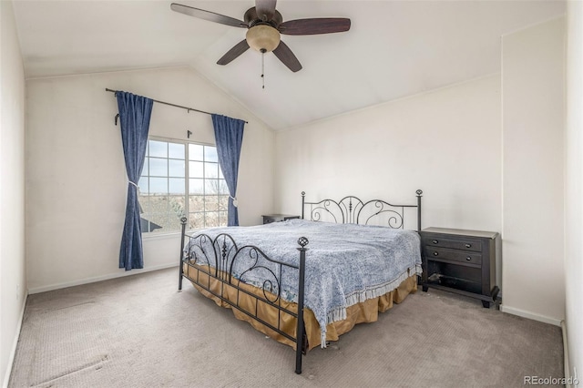 bedroom featuring lofted ceiling, carpet floors, and ceiling fan