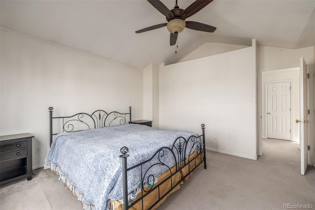 bedroom with lofted ceiling, light colored carpet, and ceiling fan