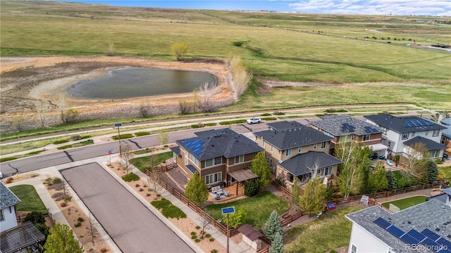 aerial view with a residential view and a water view