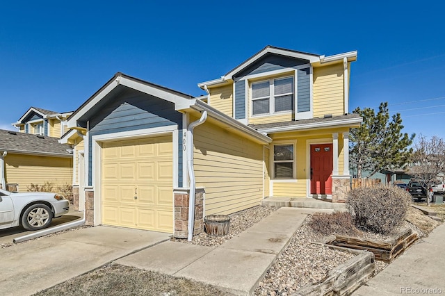 view of front of home with a garage and concrete driveway