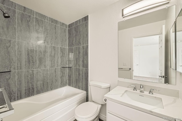 bathroom featuring vanity,  shower combination, and toilet