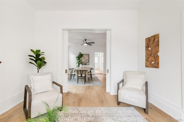 230 E Ellsworth Ave, Denver, CO 80209 - sitting room featuring light wood-type flooring and baseboards