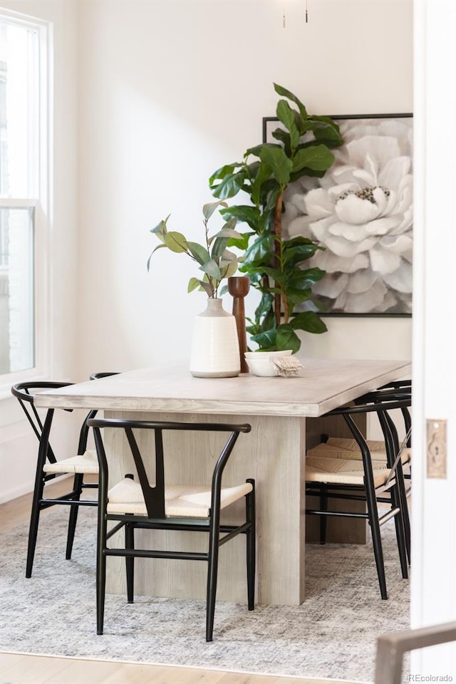 230 E Ellsworth Ave, Denver, CO 80209 - dining space with wood finished floors