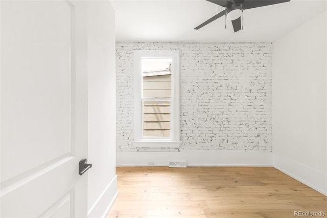 230 E Ellsworth Ave, Denver, CO 80209 - spare room with a ceiling fan and wood finished floors