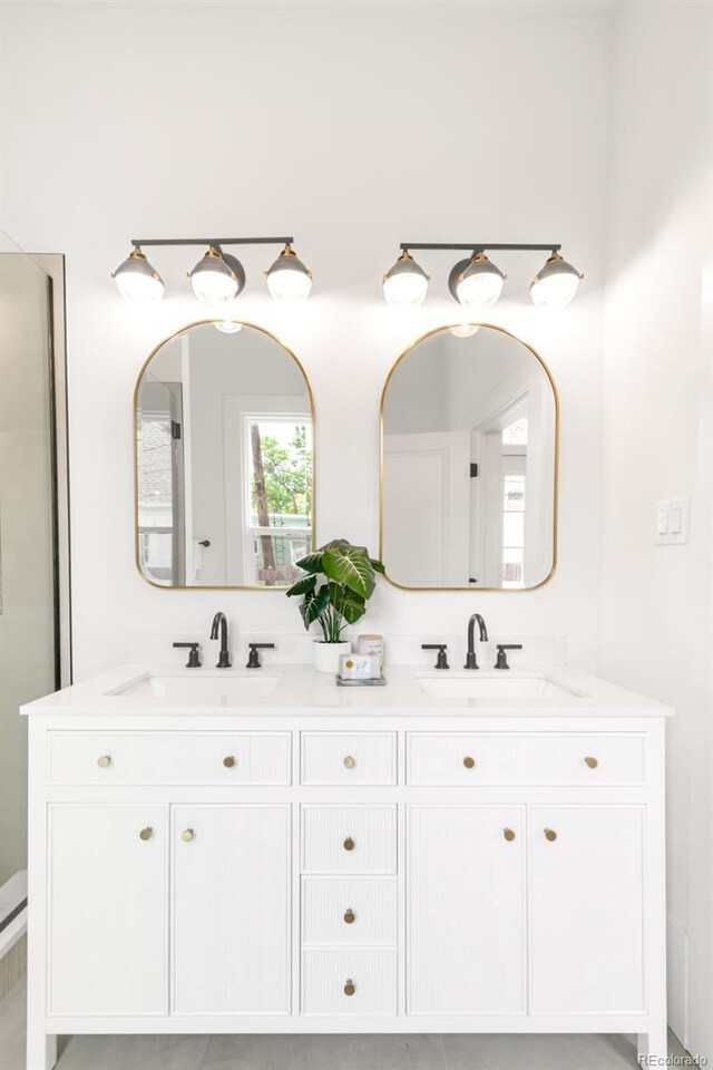 230 E Ellsworth Ave, Denver, CO 80209 - full bath featuring double vanity