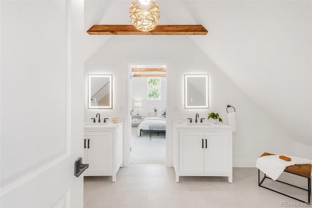 230 E Ellsworth Ave, Denver, CO 80209 - bathroom featuring two vanities and ensuite bath