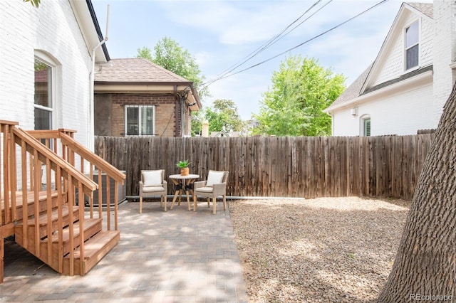 230 E Ellsworth Ave, Denver, CO 80209 - fenced backyard featuring a patio area