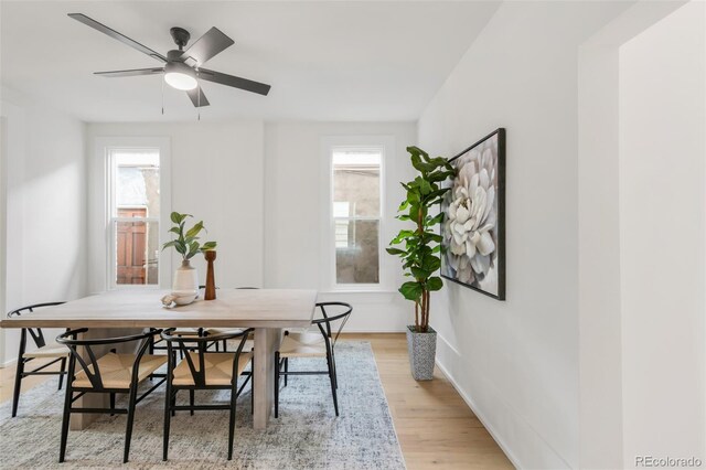 230 E Ellsworth Ave, Denver, CO 80209 - dining room with light wood-type flooring and baseboards