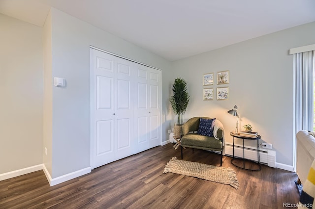 937 N Clarkson St Unit 405, Denver, CO 80218 - sitting room with baseboard heating and wood finished floors