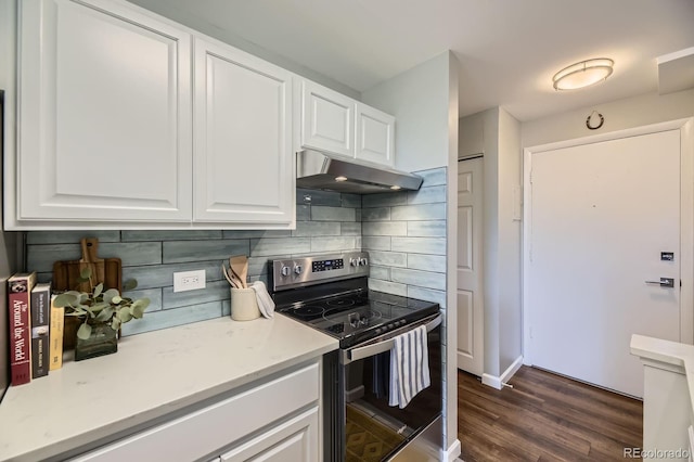 937 N Clarkson St Unit 405, Denver, CO 80218 - kitchen featuring stainless steel electric range, under cabinet range hood, backsplash, white cabinets, and dark wood-style flooring