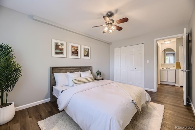937 N Clarkson St Unit 405, Denver, CO 80218 - bedroom with dark wood-style flooring, a closet, and a ceiling fan