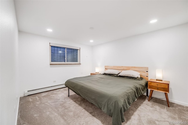 20 S Logan St Unit 104, Denver, CO 80209 - carpeted bedroom featuring a baseboard heating unit, recessed lighting, and baseboards