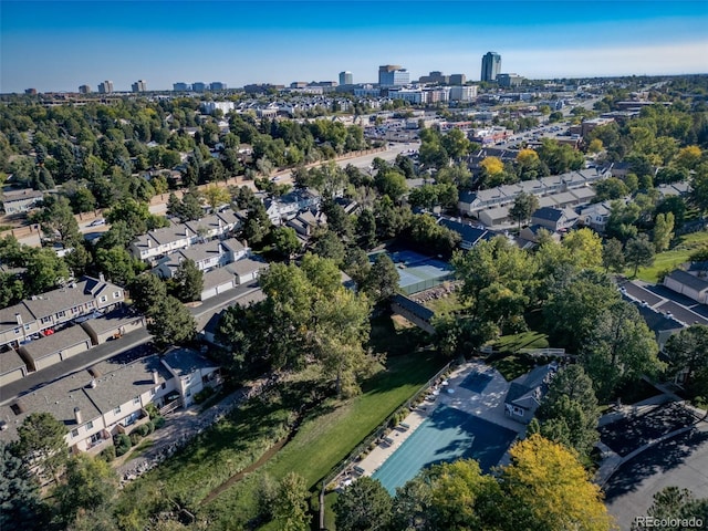 aerial overview of property's location featuring a skyline view