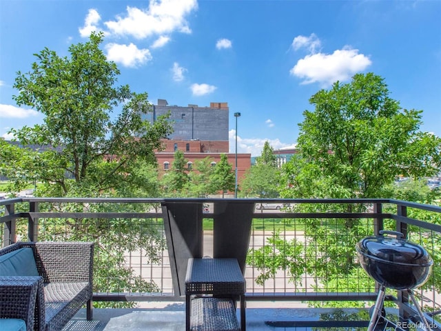 balcony featuring a grill