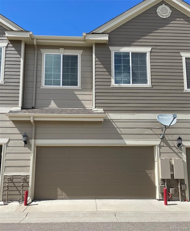16285 W 62nd Ln Unit C, Arvada, CO 80403 - view of home's exterior featuring an attached garage