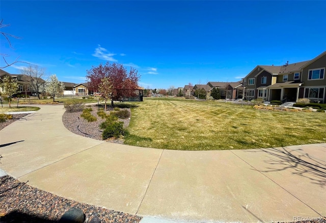 16285 W 62nd Ln Unit C, Arvada, CO 80403 - view of grassy yard featuring a residential view