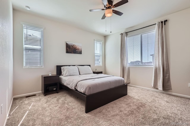 24374 E 42nd Ave, Aurora, CO 80019 - bedroom featuring carpet floors, baseboards, and a ceiling fan