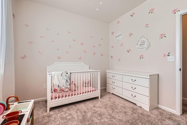 24374 E 42nd Ave, Aurora, CO 80019 - carpeted bedroom featuring a nursery area and baseboards