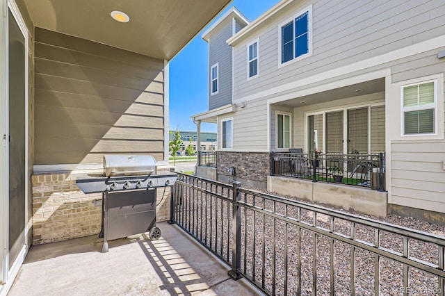 24374 E 42nd Ave, Aurora, CO 80019 - view of patio / terrace with a grill