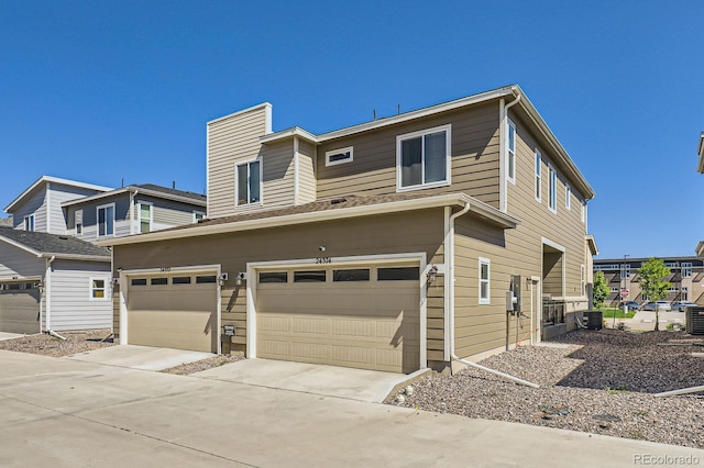 24374 E 42nd Ave, Aurora, CO 80019 - view of front facade with a garage and driveway