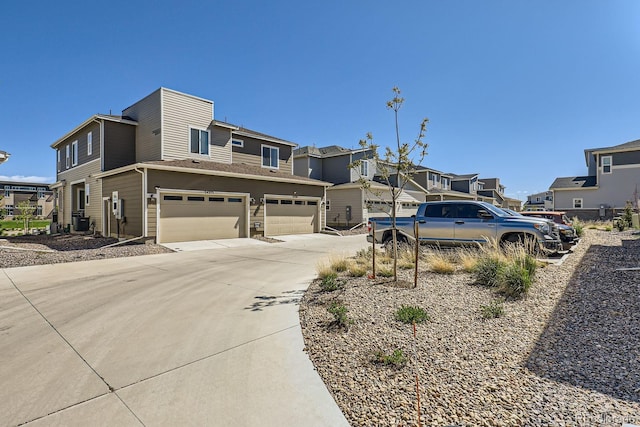 24374 E 42nd Ave, Aurora, CO 80019 - view of front of home with a garage, concrete driveway, a residential view, and cooling unit