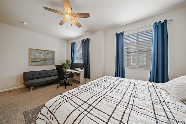 bedroom with baseboards, carpet flooring, and a ceiling fan